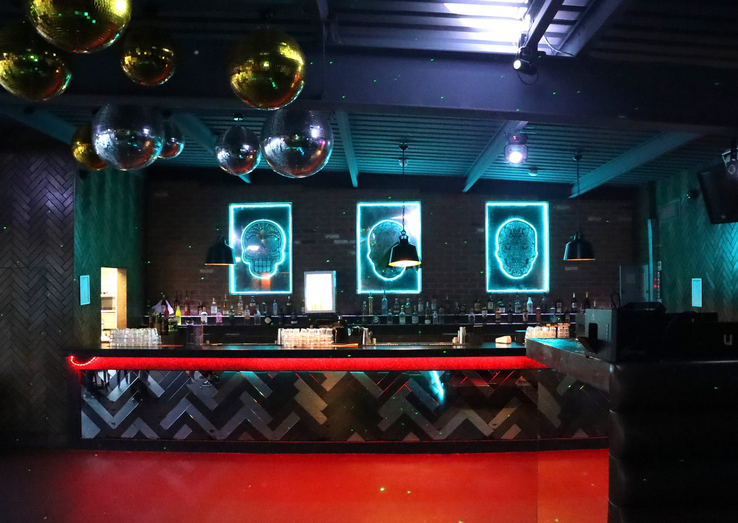 The SOHO bar under a ceiling of mirrorballs